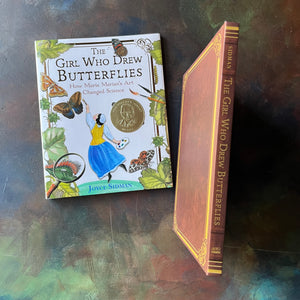 The Girl Who Drew Butterflies-How Maria Merian's Art Changed Science-written by Joyce Sidman with illustrations by Maria Merian-a Robert F. Sibert Medal Winner-living science children's book-view of the spine