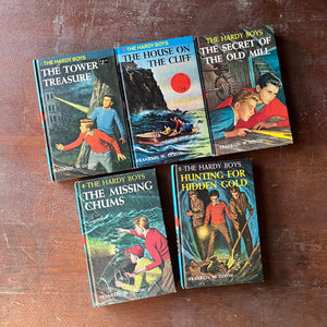 vintage adventure books for boys - The Hardy Boys Mysteries Starter Set First 5 Volumes Written by Franklin W. Dixon - view of the front covers with illustrations from each book