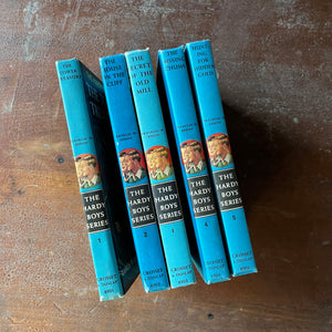vintage adventure books for boys - The Hardy Boys Mysteries Starter Set First 5 Volumes Written by Franklin W. Dixon - view of the spines
