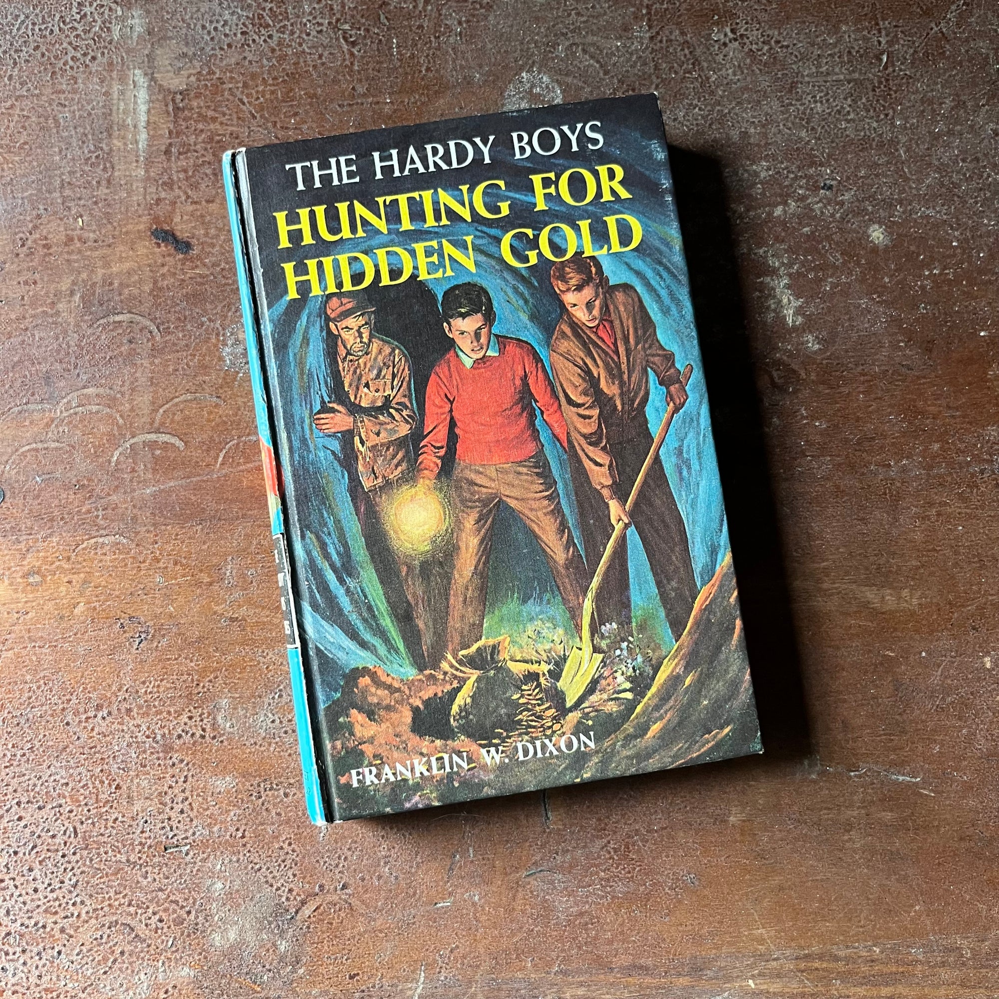 vintage children's book, vintage adventure book for boys, The Hardy Boys Mystery - Hardy Boys #5 Hunting for Hidden Gold by Franklin W. Dixon - view of the front cover