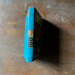 vintage children's book, vintage adventure book for boys, The Hardy Boys Mystery - Hardy Boys #5 Hunting for Hidden Gold by Franklin W. Dixon - view of the spine