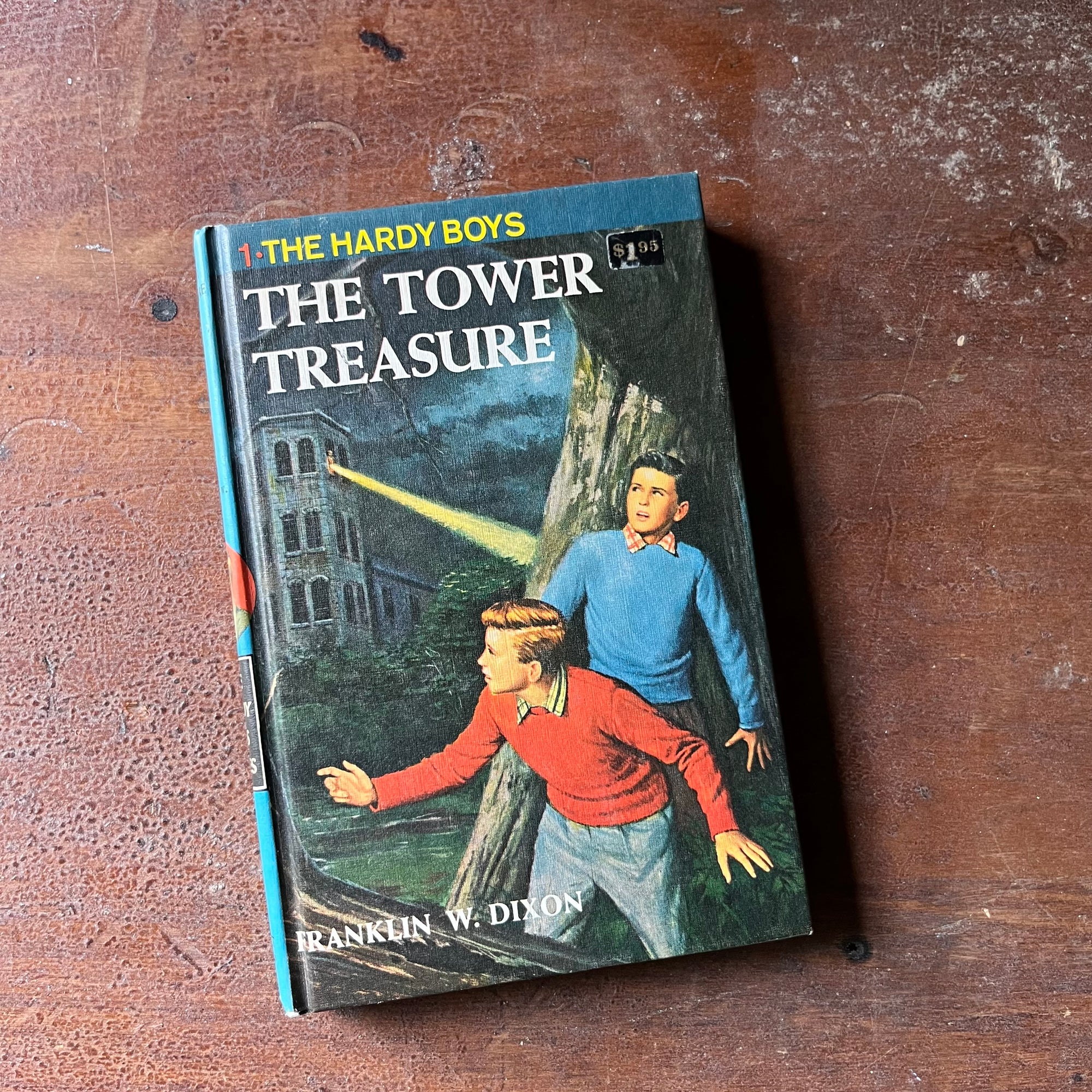 vintage children's book, vintage chapter books, vintage adventure books for boys, The Hardy Boys Mystery Series - The Hardy Boys #1 The Tower Treasure written by Franklin W. Dixon - view of the front cover