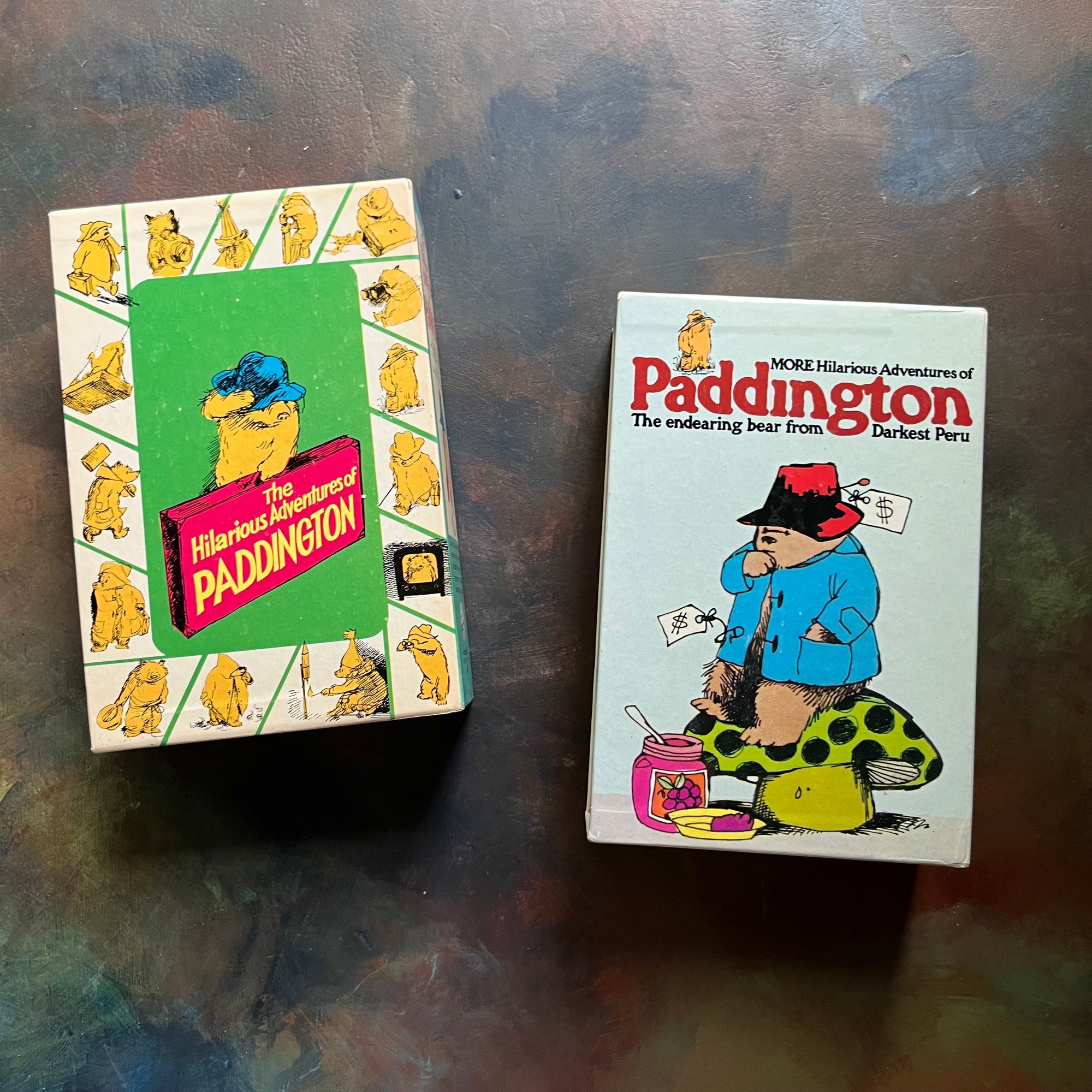 The Hilarious Adventures of Paddington the Bear & More Hilarious Adventures of Paddington Book Sets written by Michael Bond-vintage children's books-view of the side of the box sleeves for each set