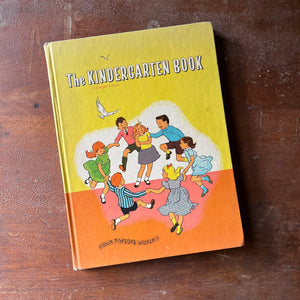 vintage children's schoolbook, vintage schoolbook - The Kindergarten Book Enlarged Edition Our Singing World - view of the front cover