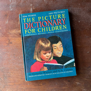 The Picture Dictionary for Children Completely Revised, Newly Illustrated by Garnette Watters and S. A. Courtis-view of the front cover with two children looking at a book