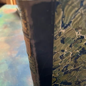 The Pioneers written by James Fenimore Cooper-book one of the leather stocking tales-antique leather-bound book with marbled cover-vintage adventure book-view of the condition of the spine
