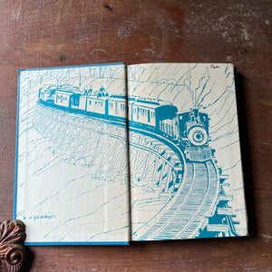 vintage children's history book, vintage chapter book, The Real Book About Series - The Real Book About Trains by Davis Cole with illustrations by David Millard - view of the inside cover page