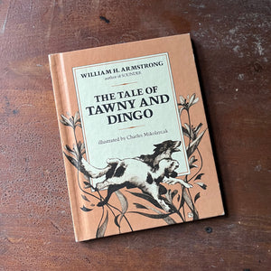 vintage children's picture book, Weekly Reader Book - The Tale of Tawny and Dingo written by William H. Armstrong with illustrations by Charles Mikolaycak - view of the front cover