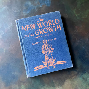 The New World and its Growth vintage social studies textbook-view of the embossed front cover in blue & orange