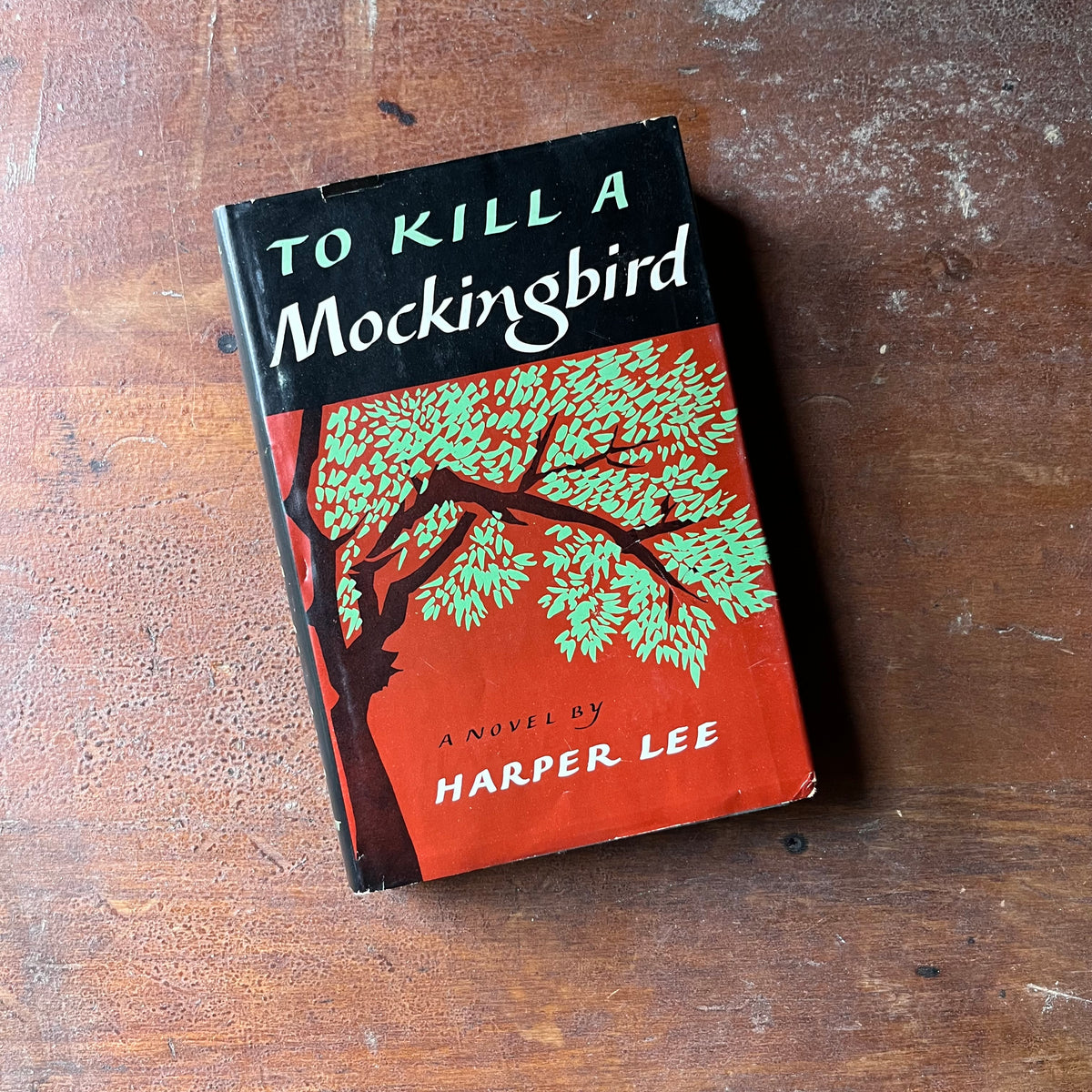 classic American Novel, Pulitzer Prize Novel - To Kill A Mockingbird by Harper Lee-1960 First Edition, 7th Printing - view of the dust jacket's front cover