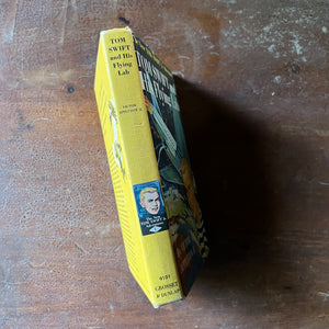 vintage children's adventure story, The New Tom Swift Jr. Adventures Book - Tom Swift and His Flying Lab written by Victor Appleton II with illustrations by Graham Kaye - view of the spine