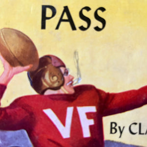 Touchdown Pass by Clair Bee-Book #1 in The Chip Hilton Sports Series Book-vintage sports book for boys-closeup of the dust jacket cover where someone drew a cigarette in the mouth of Chip Hilton