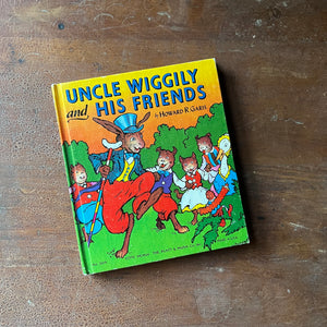 vintage children's storybook - Uncle Wiggily & His Friends written by Howard R. Garis - view of the colorful front cover with an illustration of Uncle Wiggily & some of this friends