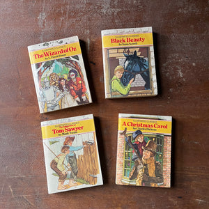 vintage children's chapter books, McDonald's Illustrated Classics - Set of 4 McDonald's Illustrated Classics Books:  The Wizard of Oz, The Adventures of Tom Sawyer, Black Beauty & A Christmas Carol - view of the front covers