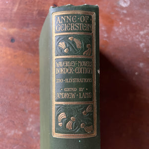 antique book, classic literature - Waverly Novels Border Edition:  Anne of Geierstein written by Sir Walter Scott, Bart. published in 1899-edited by Andrew Lang - closeup view of the embossed spine with details of the book & a design all in a three panel block border