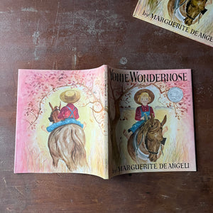 Yonie Wondernose written and illustrated by Marguerite De Angeli-A Caldecott Honor Book-vintage children's picture book-view of the front & back cover of the dust jacket