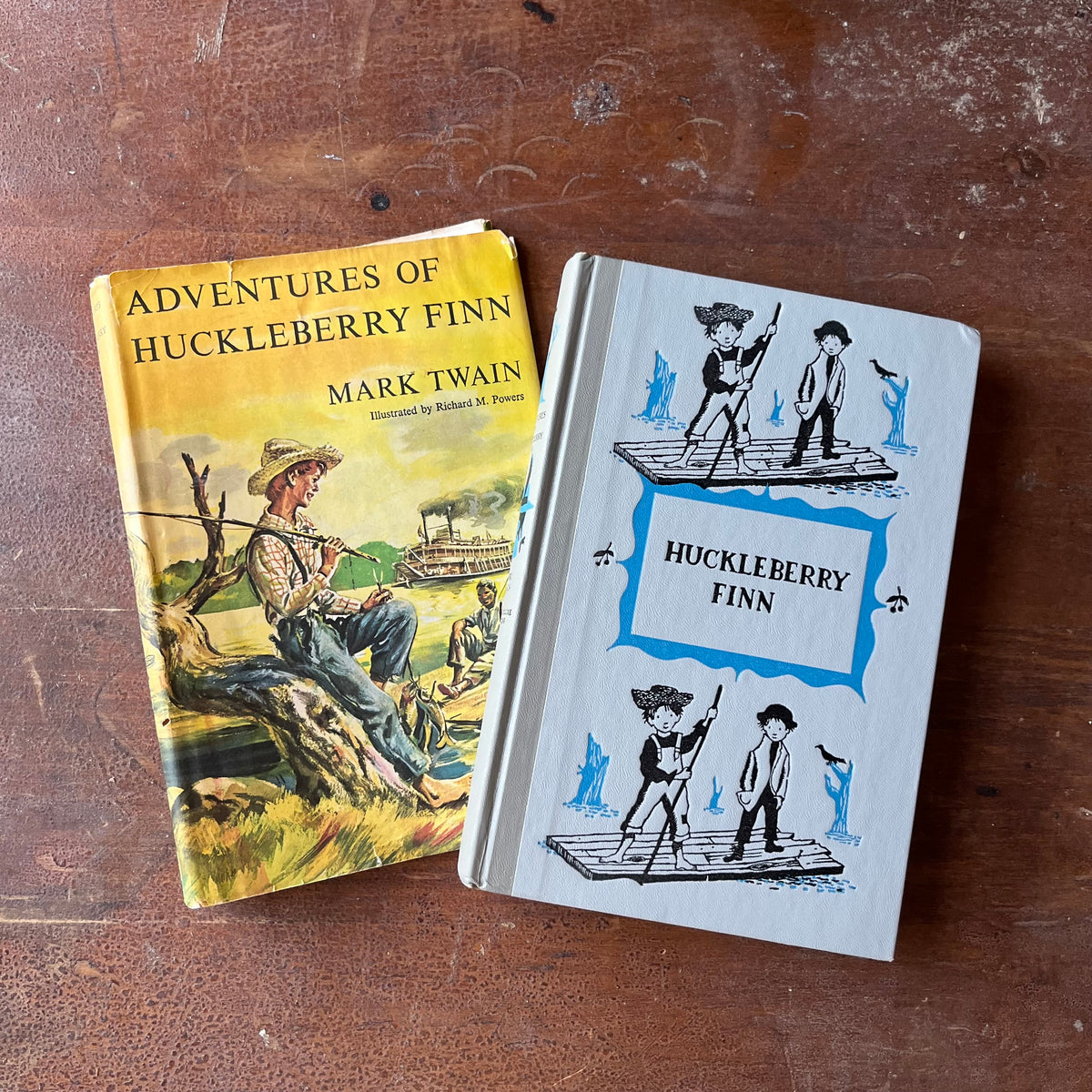 Log Cabin Vintage – vintage children’s book, children’s book, chapter books, Junior Deluxe Editions – Adventures of Huckleberry Finn by Mark Twain with illustrations by Richard M. Powers - view of the embossed front cover