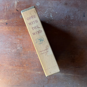 Log Cabin Vintage – classic literature – epic saga - Gone with the Wind by Margaret Mitchell illustrated by Ben Stahl - view of the book sleeve spine