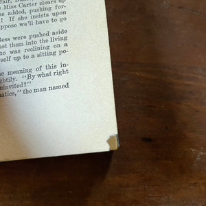 Nancy Drew Mysteries: The Clue of the Tapping Heels by Carolyn Keene - view of the small page tear along one page corner