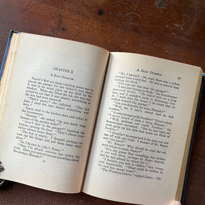 Nancy Drew Mysteries: The Clue of the Tapping Heels by Carolyn Keene - view of the book pages opened to chapter 10:  A Boat Disaster