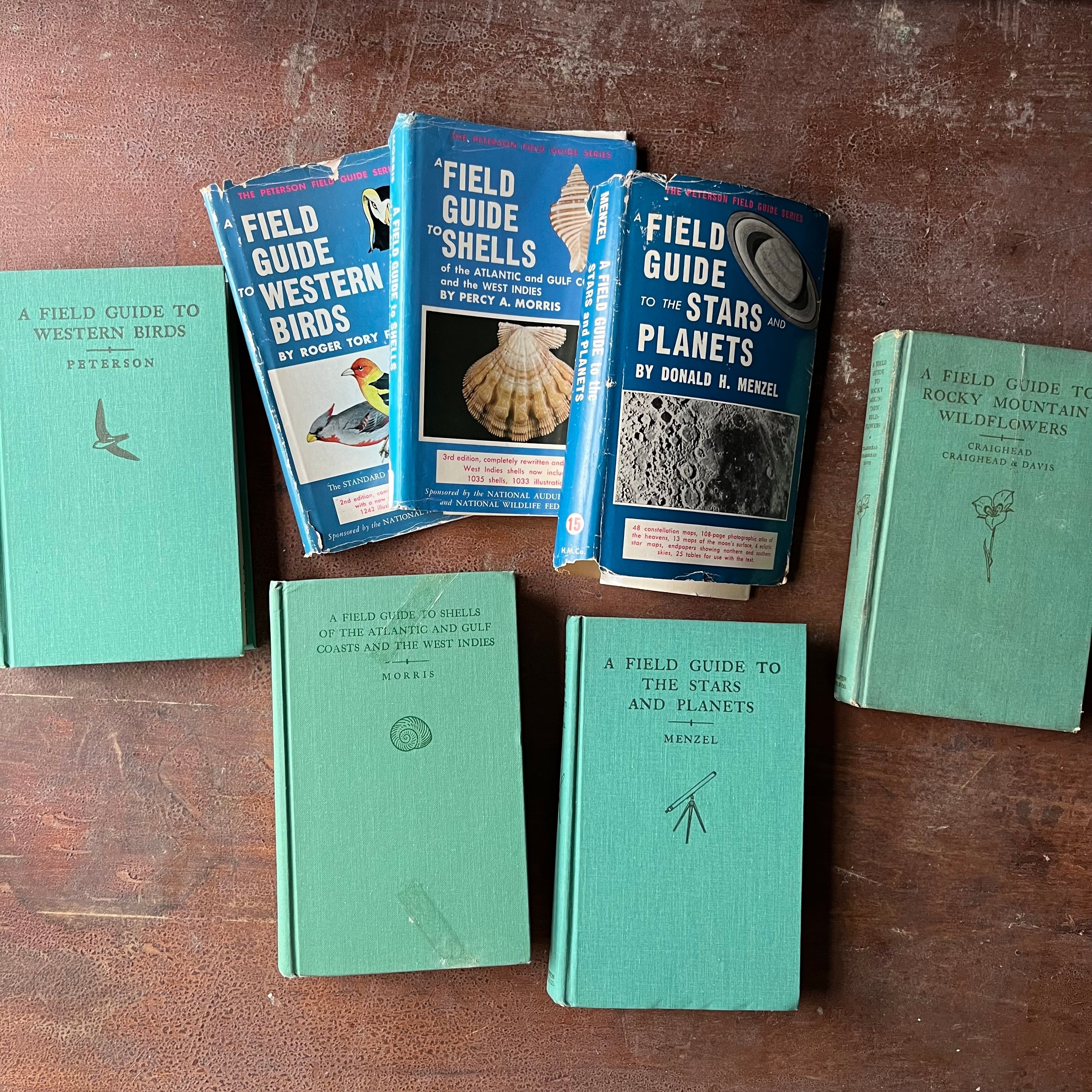 Log Cabin Vintage – vintage non-fiction – nature books – bird identification book – field guide – Peterson Field Guide – Set of Four Peterson Field Guides:  Western Birds, Shells, Stars and Planets & Rocky Mountain Wildflowers - view of the dust jackets and front covers