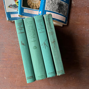 Log Cabin Vintage – vintage non-fiction – nature books – bird identification book – field guide – Peterson Field Guide – Set of Four Peterson Field Guides:  Western Birds, Shells, Stars and Planets & Rocky Mountain Wildflowers - view of the spines