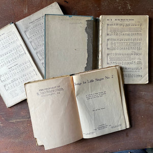 Set of Three Vintage Hymnals - Songs for Little Singers, The Primary Sunday School Hymns, & Songs of the Peacemaker - view of their inside covers