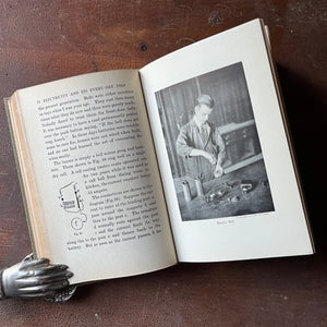 The Children's Library of Work and Play:  Electricity by John F. Woodhull - inside view of a photograph - view of the book sitting on a wood table