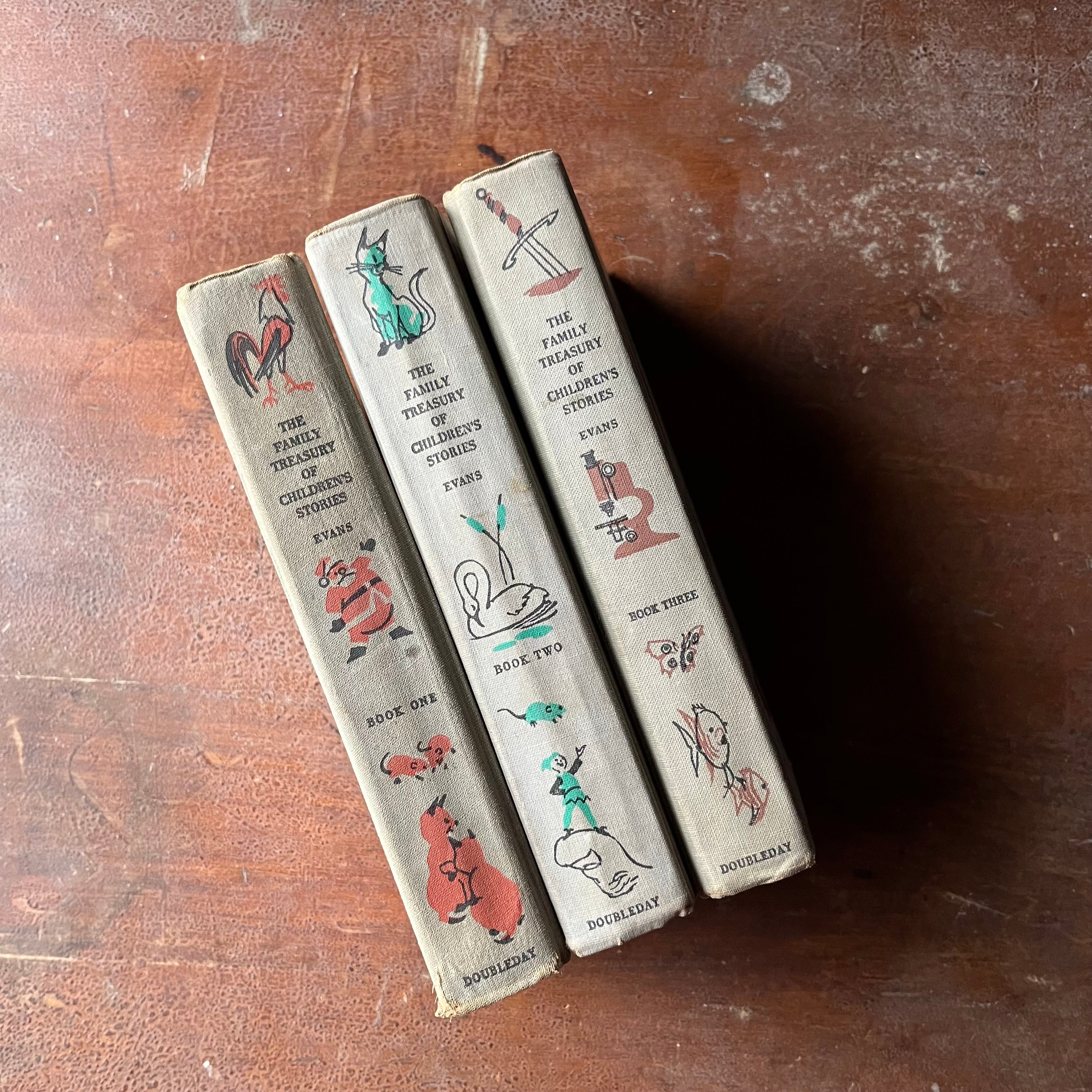 Log Cabin Vintage – vintage children’s book, children’s book, Junior Deluxe Editions – The Family Treasury of Children's Stories Complete Three Book Set - view of the spines