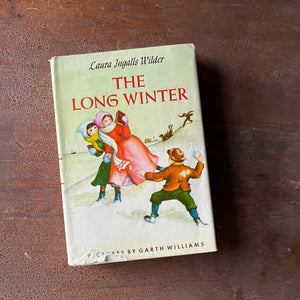 Log Cabin Vintage – vintage children’s book, children’s book, chapter book, Little House on the Prairie Series – The Long Winter by Laura Ingalls Wilder with Illustrations by Garth Williams - view of the dust jacket's front cover