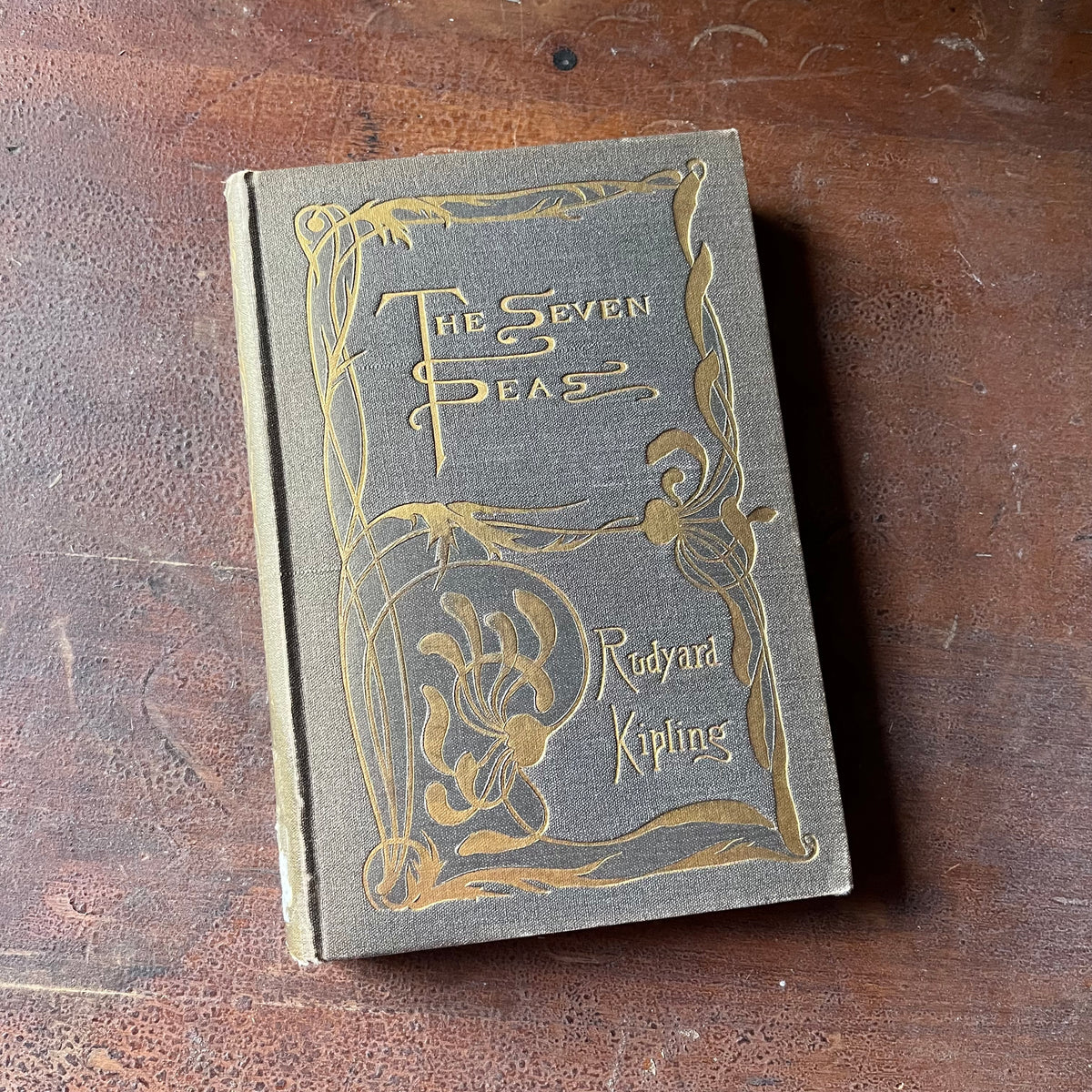 The Seven Seas by Rudyard Kipling - 1898 Edition of Poetry - view of the embossed front cover