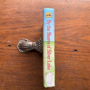 Log Cabin Vintage – vintage children’s book, children’s book, chapter book, Little House on the Prairie Series – By the Shores of Silver Lake by Laura Ingalls Wilder with Illustrations by Garth Williams - view of the dust jacket's spine