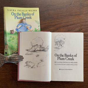 On the Banks of Plum Creek by Laura Ingalls Wilder - a 1981 HarperCollins Publisher Edition with Dust Jacket